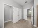 Walk-in closet featuring neutral paint, carpet, and shelving at 12713 Whitney Meadow Way, Riverview, FL 33578