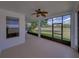 Patio featuring tile floors, neutral paint, ceiling fan, and lots of windows at 12713 Whitney Meadow Way, Riverview, FL 33578