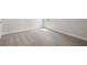 Bedroom featuring neutral carpet, base trim, and natural light at 13137 Wellspring Dr, Lithia, FL 33547