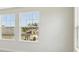 Bright, naturally lit room with two large windows offering neighborhood views at 13137 Wellspring Dr, Lithia, FL 33547
