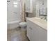Well-maintained bathroom featuring a combination shower and tub with ample counter space at 13440 Gulf Blvd # 501, Madeira Beach, FL 33708