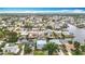 Scenic aerial view of waterfront homes lining canals, showcasing the vibrant community at 13918 Raie Ave, Hudson, FL 34667