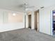 Bedroom features a fan, a closet, and a window with lots of natural light at 13918 Raie Ave, Hudson, FL 34667