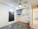 Utility room features a water heater, sink, cabinets, and durable flooring at 13918 Raie Ave, Hudson, FL 34667