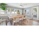 Well-lit dining room with a bright, airy feel featuring a wooden table and natural light at 1503 4Th St Sw, Largo, FL 33770
