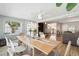 Dining area with natural light and stylish decor, connecting to the kitchen and living room at 1503 4Th St Sw, Largo, FL 33770