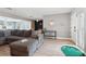 Bright and airy living room with comfortable seating, golf putting area, and stylish decor at 1503 4Th St Sw, Largo, FL 33770