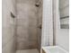 Tiled shower stall with a rain shower head and built in niche at 1503 4Th St Sw, Largo, FL 33770