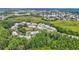 A picturesque neighborhood with tree-lined streets and lake views, offering a serene and idyllic living environment at 1628 Lullwater Ln, Lutz, FL 33549