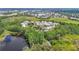 Scenic community offering tranquil lake views and a private dock for fishing or simply soaking in the natural beauty at 1628 Lullwater Ln, Lutz, FL 33549
