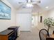 Bright upstairs home office with closet, featuring a neutral color scheme at 1628 Lullwater Ln, Lutz, FL 33549