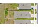 Aerial view of houses showing roof tops and fenced-in yards in a residential community at 16892 Delia St, Wimauma, FL 33598