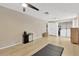 Large bonus room with laminate flooring, laundry area, storage cabinets, and neutral paint, ideal for flexible living at 1726 York S St, Gulfport, FL 33707