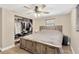 Comfortable main bedroom featuring a ceiling fan, closet, and a neutral color palette at 1726 York S St, Gulfport, FL 33707