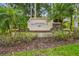 Elegant Montreux community sign framed by lush landscaping and swaying palm trees, welcoming residents and guests at 19106 Beckett Dr, Odessa, FL 33556
