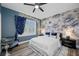 Nicely decorated bedroom with modern furniture, stylish window treatments, and wood flooring at 19620 Eagle Crest Dr, Lutz, FL 33549