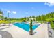 A beautiful pool with a lounge area, surrounded by lush landscaping, offering a serene outdoor space at 19620 Eagle Crest Dr, Lutz, FL 33549