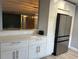 Open-concept kitchen boasts stainless steel appliances, sleek countertops, and seamless flow to living spaces at 2278 Republic Dr, Dunedin, FL 34698