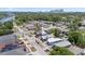 Aerial view of the neighborhood featuring homes with trees and the Tampa skyline in the background at 2306 W Ivy St, Tampa, FL 33607