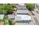 Overhead aerial view of the houses showing trees and the surrounding neighborhood at 2306 W Ivy St, Tampa, FL 33607