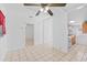 Bright dining room with tile floor and view into the kitchen at 2306 W Ivy St, Tampa, FL 33607