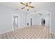 Bright and open living room featuring tiled floors and neutral paint at 2306 W Ivy St, Tampa, FL 33607