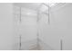 Organized walk-in closet with shelving for efficient storage and easy access to belongings at 2306 W Ivy St, Tampa, FL 33607