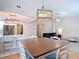 Inviting living area featuring modern lighting fixtures and an open floor plan at 2707 Lakeville Dr, Tampa, FL 33618