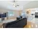 Open-concept living space with view of the dining and kitchen areas at 2707 Lakeville Dr, Tampa, FL 33618