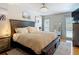 Inviting bedroom with natural light, a luxurious bed, and stylish decor at 2707 Lakeville Dr, Tampa, FL 33618