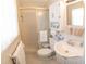 Functional bathroom featuring a stand-up shower, vanity with storage, and tiled floors at 2854 60Th N St, St Petersburg, FL 33710