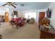 Cozy living room with comfortable seating, a vintage piano, and a bright, airy feel at 2854 60Th N St, St Petersburg, FL 33710