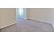 A cozy carpeted bedroom offering a comfortable retreat with ample space and natural light, ideal for relaxation at 2882 Peony Prairie Ln, Wesley Chapel, FL 33543