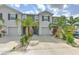 Charming two-story townhome with a well-maintained yard and two-car garage at 2882 Peony Prairie Ln, Wesley Chapel, FL 33543