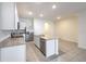 Spacious kitchen with an island, stainless steel appliances, and recessed lighting at 2882 Peony Prairie Ln, Wesley Chapel, FL 33543