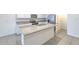 Well-lit kitchen featuring granite countertops, stainless steel appliances, and tile flooring at 2882 Peony Prairie Ln, Wesley Chapel, FL 33543