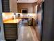 Modern kitchen with stylish cabinets, butcher block counters, and stainless steel appliances at 307 Druid Hills Rd, Temple Terrace, FL 33617