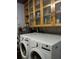 Laundry area with upper cabinets and full-sized washing machine and dryer at 307 Druid Hills Rd, Temple Terrace, FL 33617