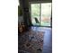 Cozy sun room featuring natural light, guitars, and an inviting view of the outdoors at 307 Druid Hills Rd, Temple Terrace, FL 33617