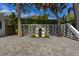 Charming backyard featuring a playhouse with a front yard in a peaceful setting, perfect for families at 3236 San Pedro St, Clearwater, FL 33759