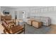 A modern living room with hardwood floors, comfortable seating, and a decorative rug at 3236 San Pedro St, Clearwater, FL 33759