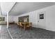 Covered patio features brick pavers, modern furniture, and access to the interior through sliding glass doors at 3236 San Pedro St, Clearwater, FL 33759