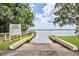 Picturesque community boat ramp providing easy access to the serene lake for residents at 3727 Janus Way, Palm Harbor, FL 34685