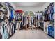 Spacious walk-in closet with custom shelving and ample storage, perfect for organizing clothes and accessories at 3727 Janus Way, Palm Harbor, FL 34685