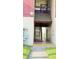 Exterior of a condo showing stairs leading to upper unit at 3829 S Lake Dr # 215, Tampa, FL 33614