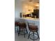 Kitchen showing counter and barstool seating at 3829 S Lake Dr # 215, Tampa, FL 33614