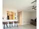 Living room features barstool seating and a ceiling fan at 3829 S Lake Dr # 215, Tampa, FL 33614