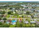 Aerial view of the property showing community, lush greenery, and waterway access at 404 12Th Sw St, Ruskin, FL 33570
