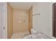 Bathroom featuring a tiled shower stall, toilet, vanity with granite countertop, and vanity mirror at 404 12Th Sw St, Ruskin, FL 33570