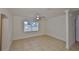 Bright bedroom with tile flooring, and a large window at 404 12Th Sw St, Ruskin, FL 33570